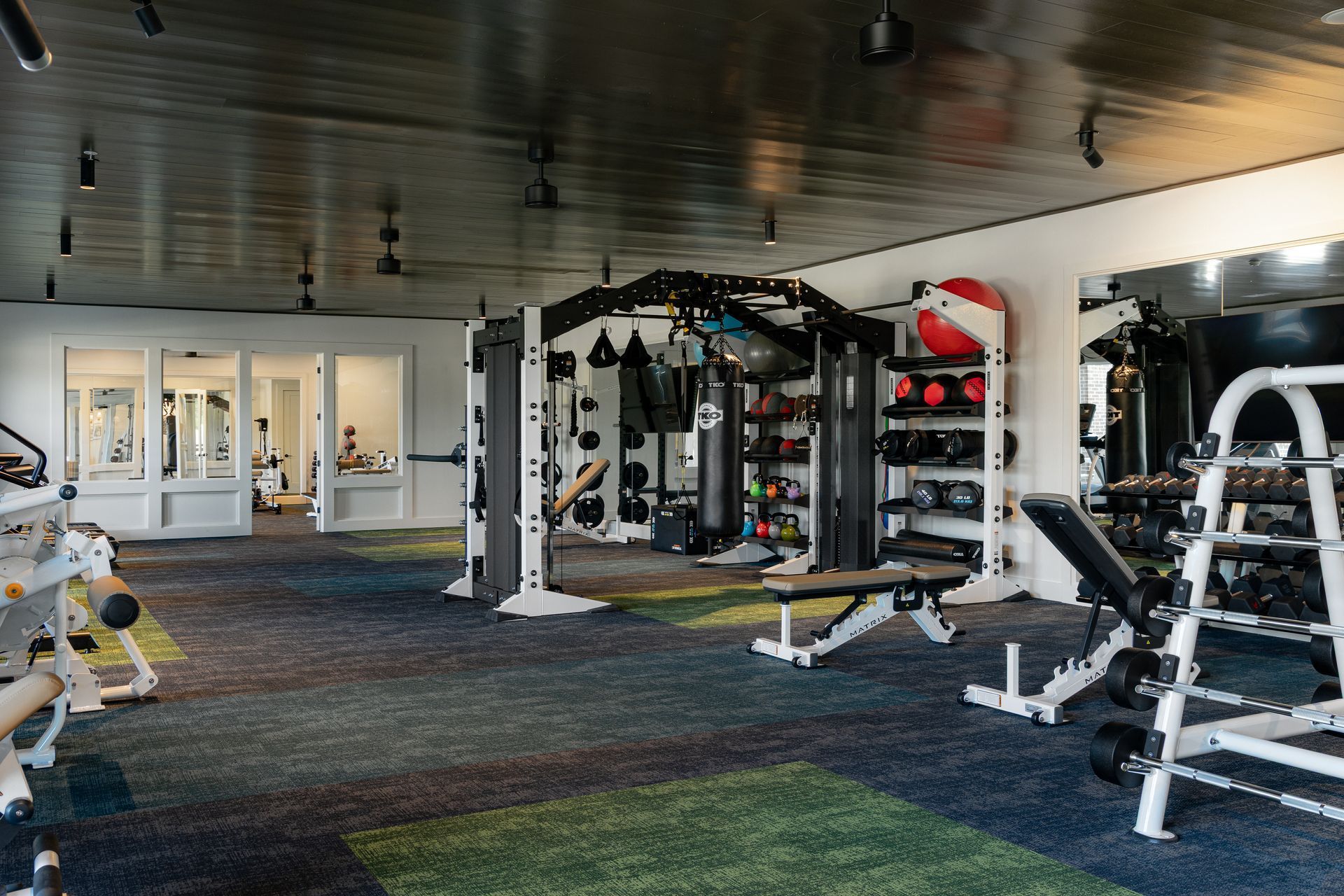 Strength training equipment and more in the fitness center at Livano Liberty Park.
