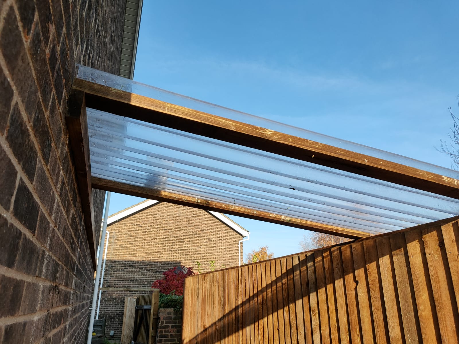 The first two struts to build a lean-to joining house to fence.