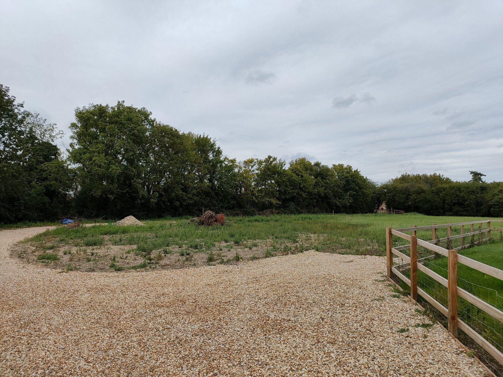 A gravelled path and entrance gate to field