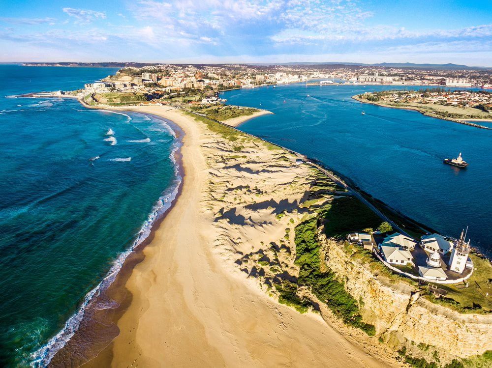 Scenic aerial view of the sea near the city — Stan Davies Excavations in Newcastle, NSW