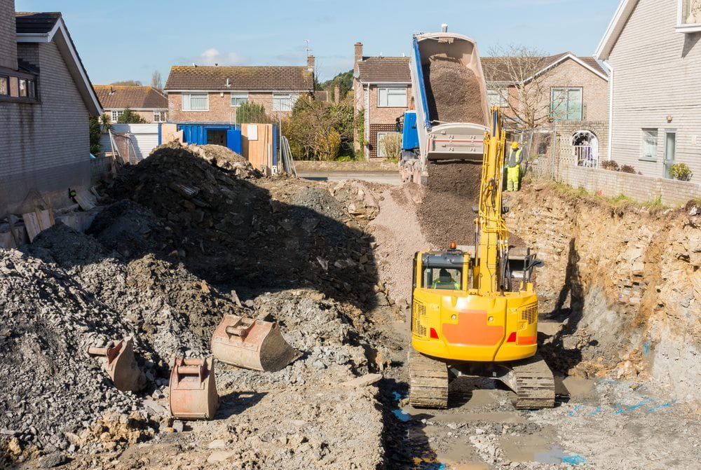 Excavator at the residential site, ready for efficient excavation and landscaping work — Stan Davies Excavations in Maitland, NSW