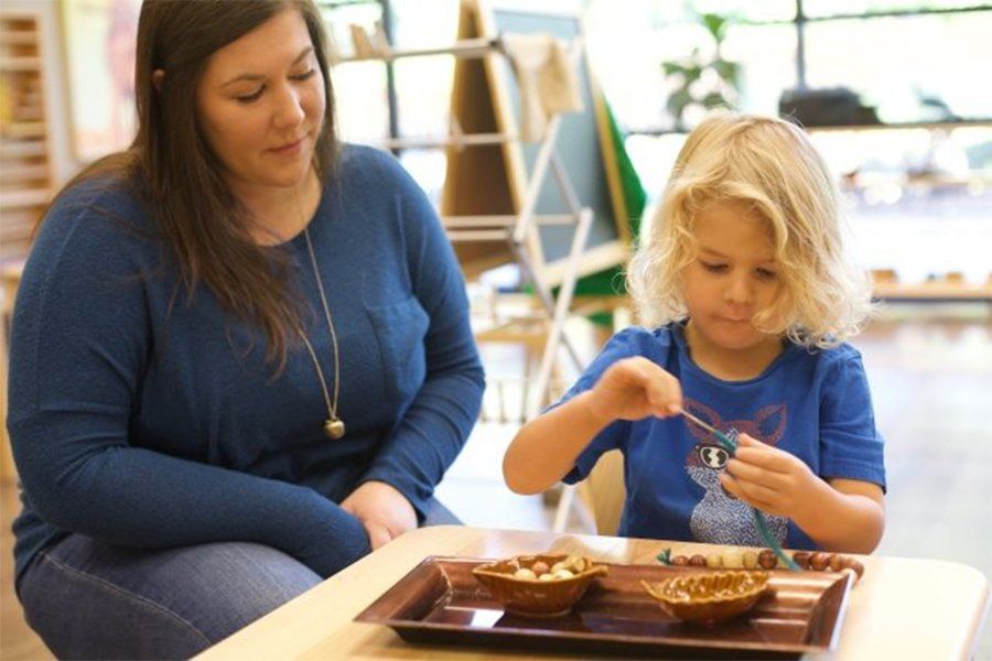 Guide observing child's work