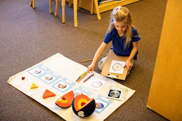 Child working on the great lessons