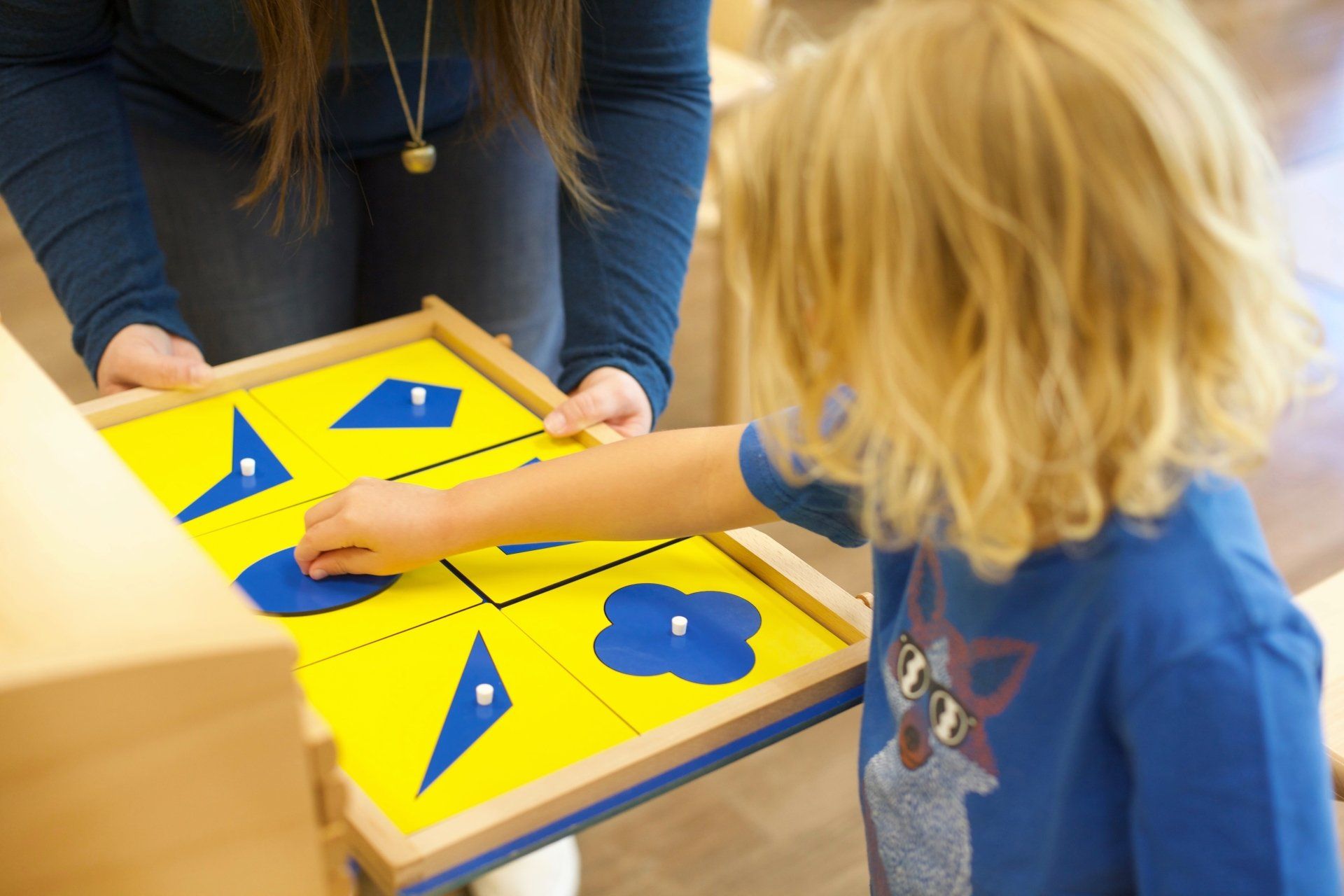 Child working with shapes