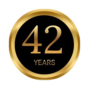 Gold and black 42 years anniversary badge with a circular metallic border