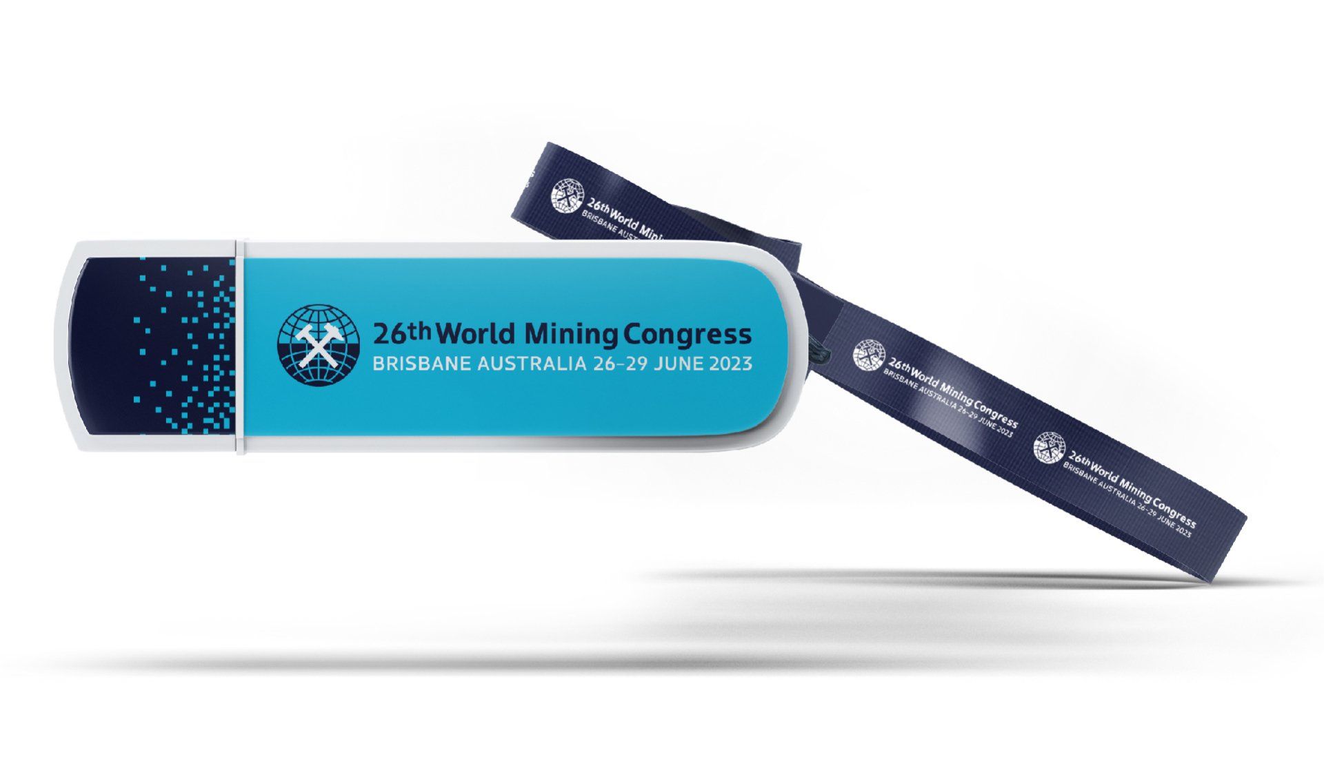 A photograph of a USB with 26th World Mining Congress branding on it: the logo and some floating point cloud imagery A photograph of a USB with 26th World Mining Congress branding on it: the logo and some floating point cloud imagery