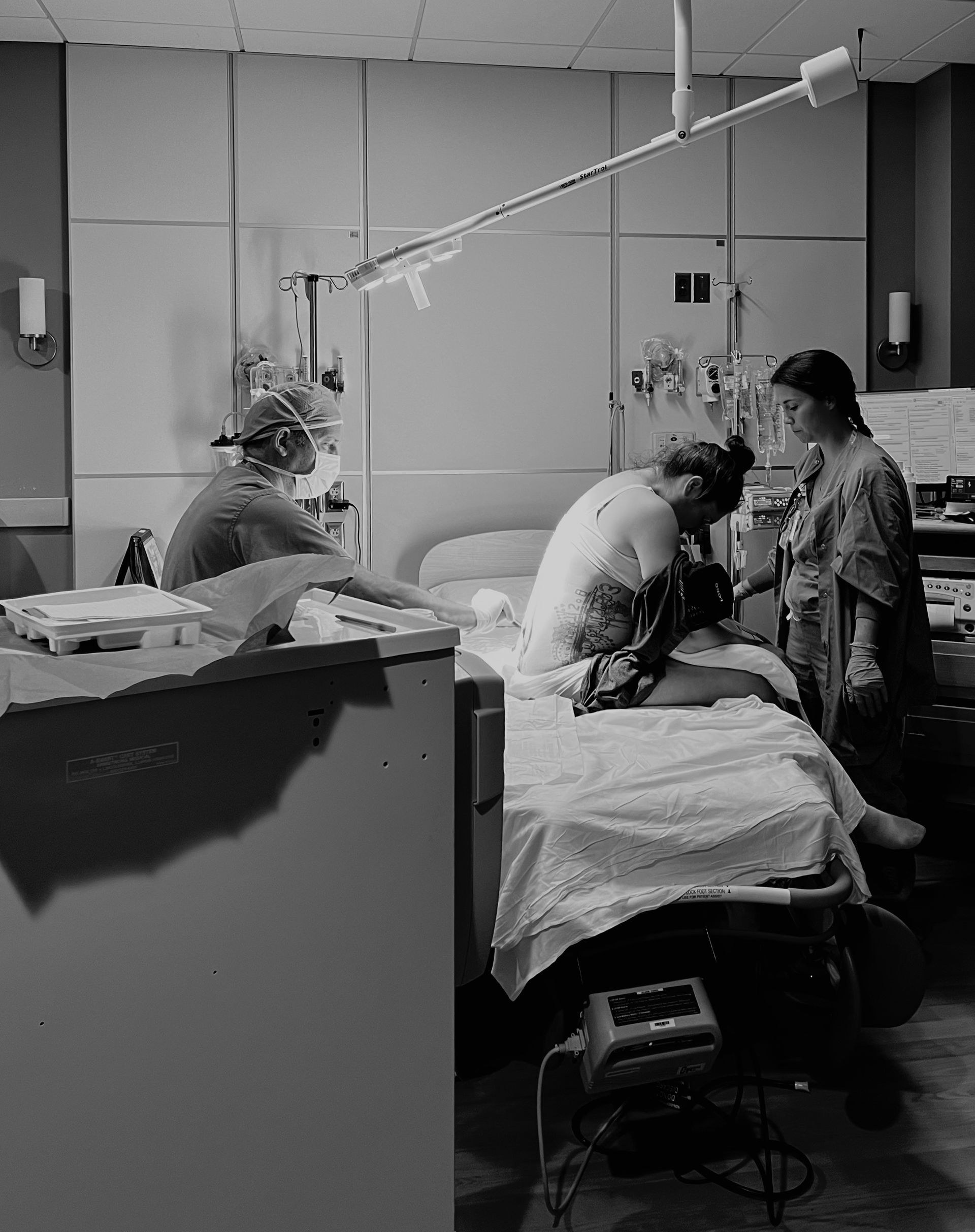 Pregnant woman in the hospital preparing to receive epidural