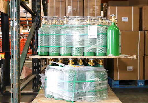 Gas tanks being moved on a forklift