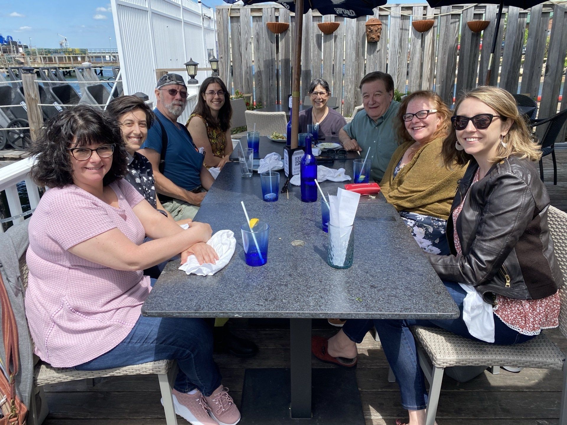A group shot of TBE's eight staff members out at lunch
