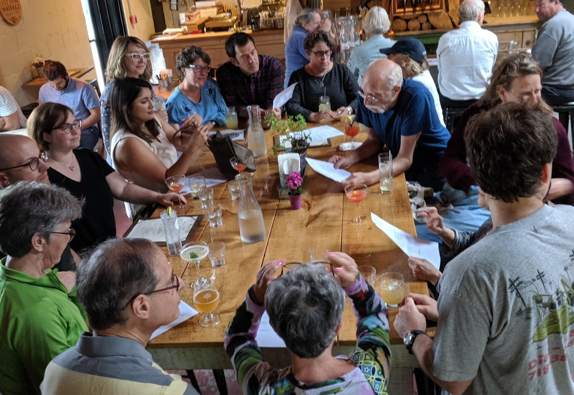 Photo of adults at a table
