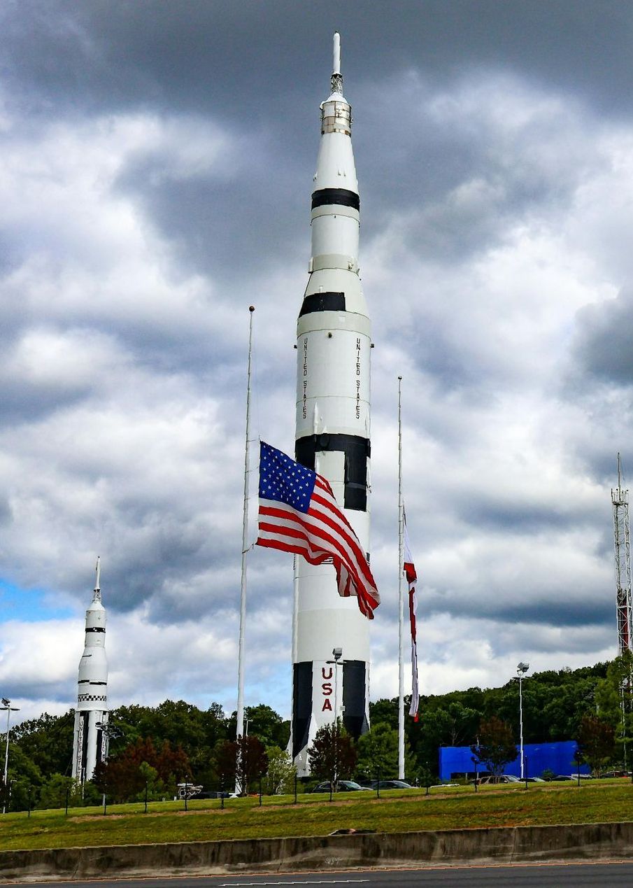 A large rocket at space center Houston with the word USA on it