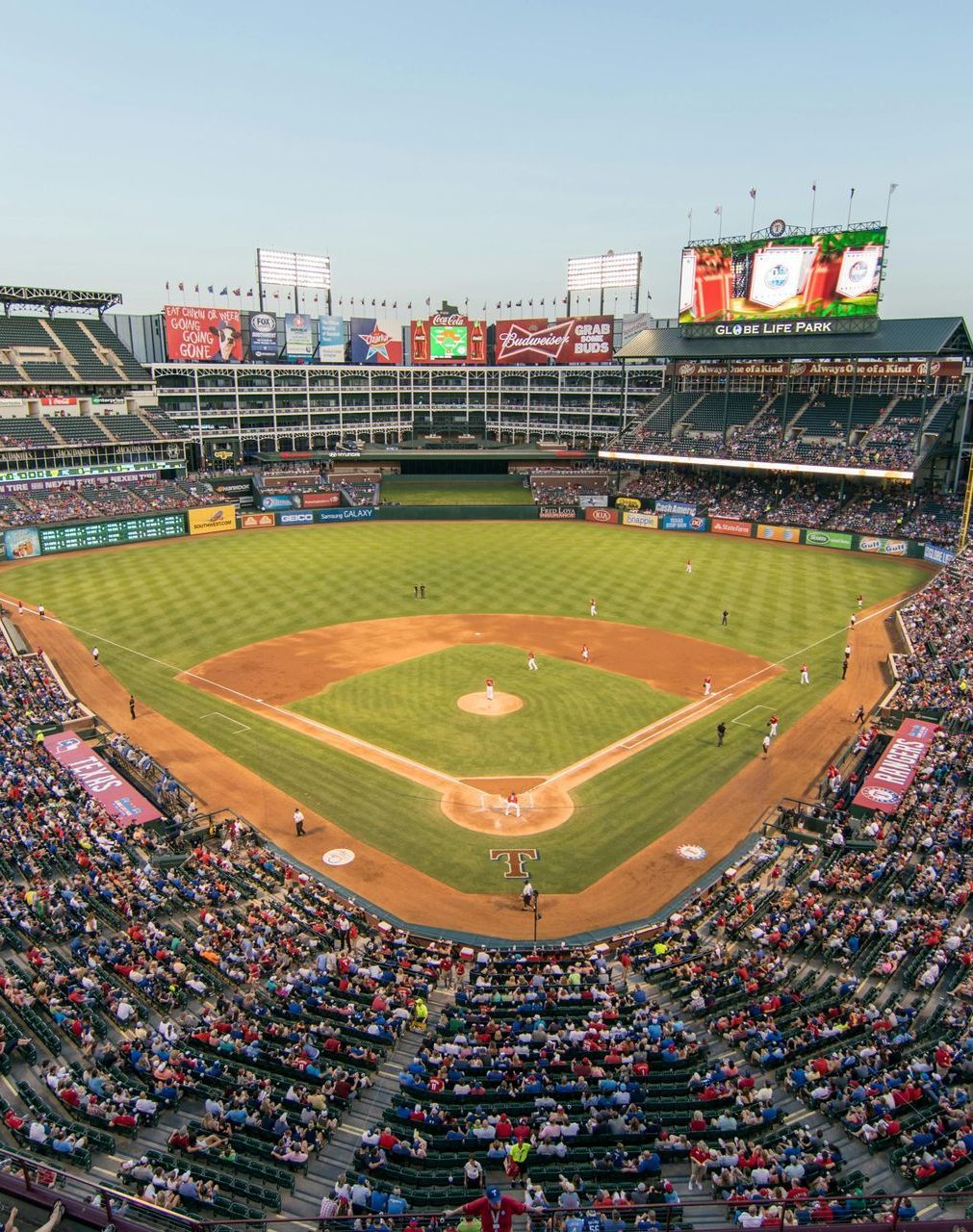 An aerial view of Globe Life Park baseball stadium filled with fans in Arlington, Tx