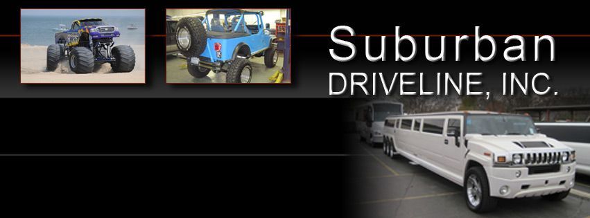 A white limousine is parked in front of a sign that says suburban driveline inc. A white limousine is parked in front of a sign that says suburban driveline inc.
