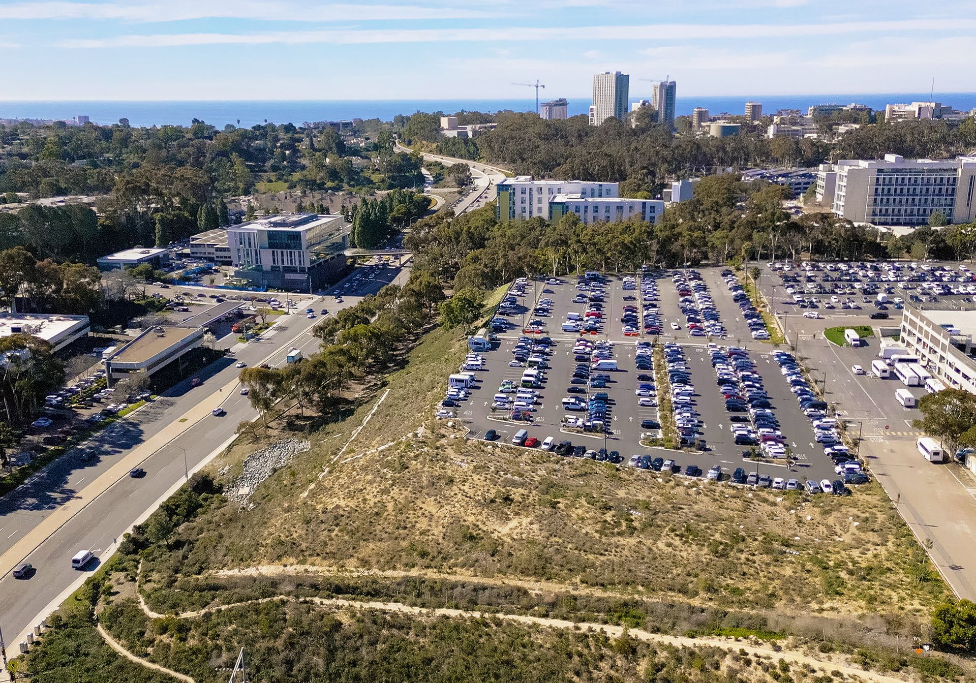 An aerial view of a parking lot in a city