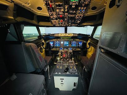 Cockpit interior: Pilot seats, instrument panel, and simulated outside view displayed on screens.