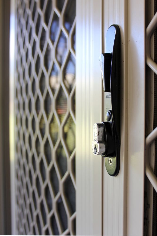 Close-up of a White Security Screen Door — Precision Doors in Berrimah, NT