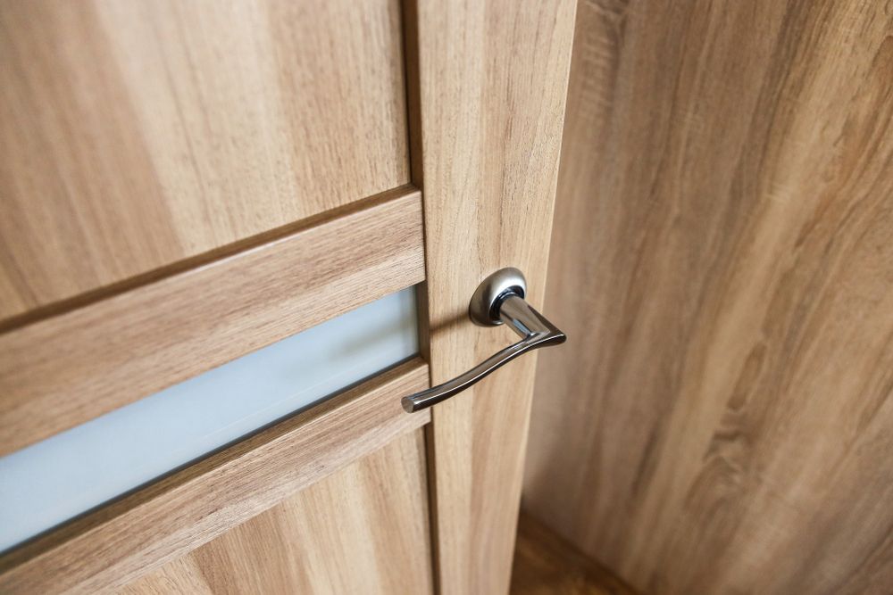 Close-Up of A Wooden Door with A Steel Door Handle — Precision Doors in Berrimah, NT