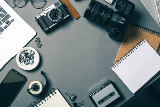 Flat lay composition with equipment for investigator on grey table.