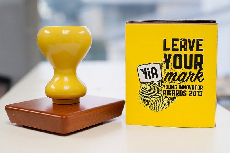 A stamp and a box that says leave your mark