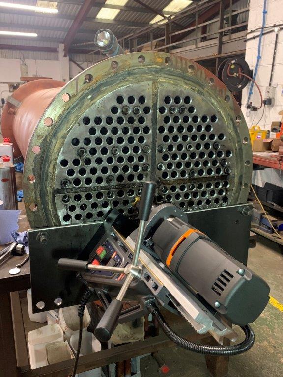 Re-tube hole prep