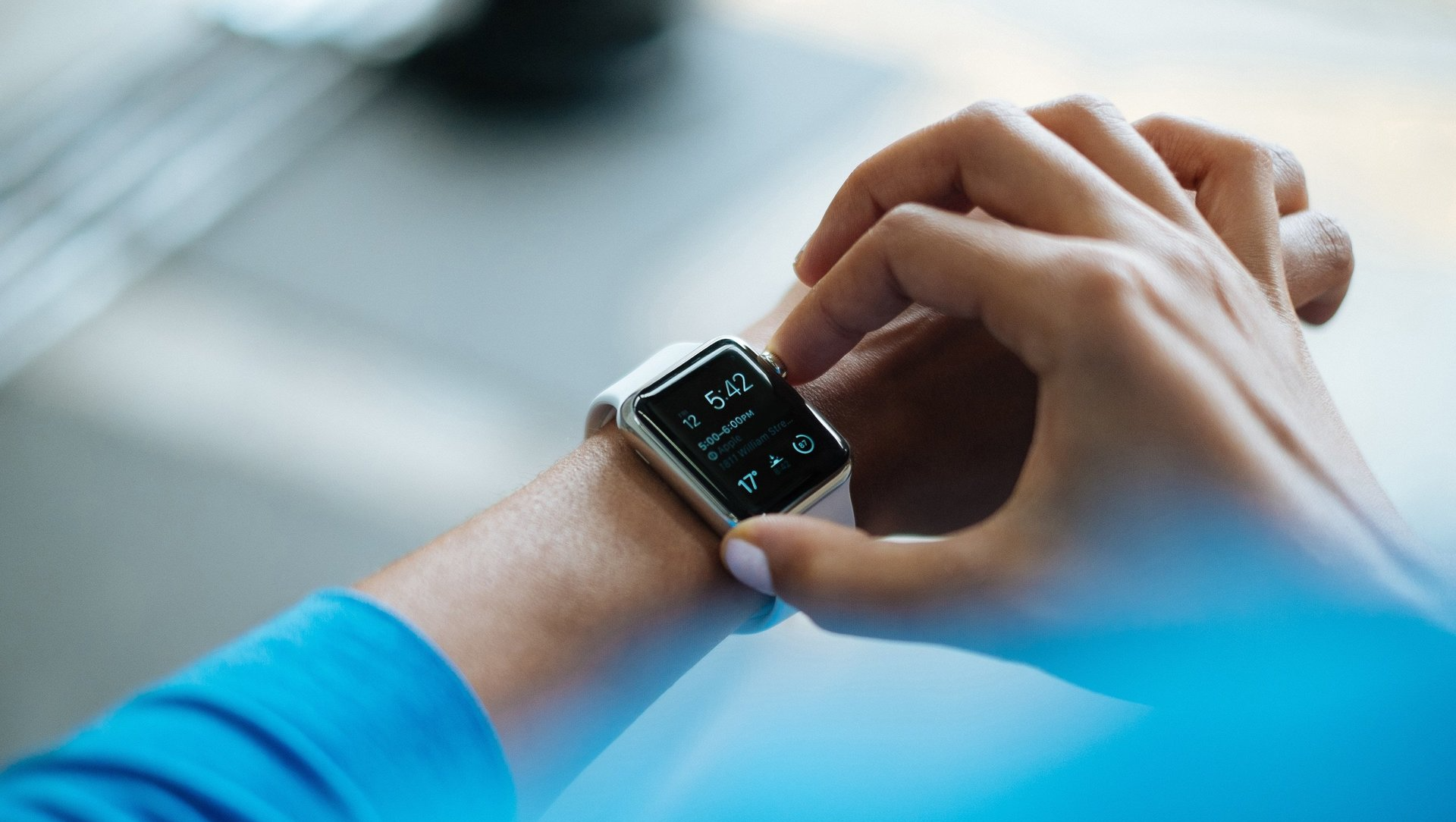 A person is wearing a smart watch on their wrist.