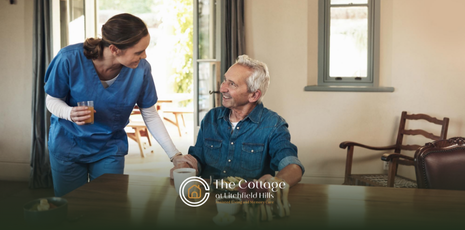 A senior and a caregiver talking to each other