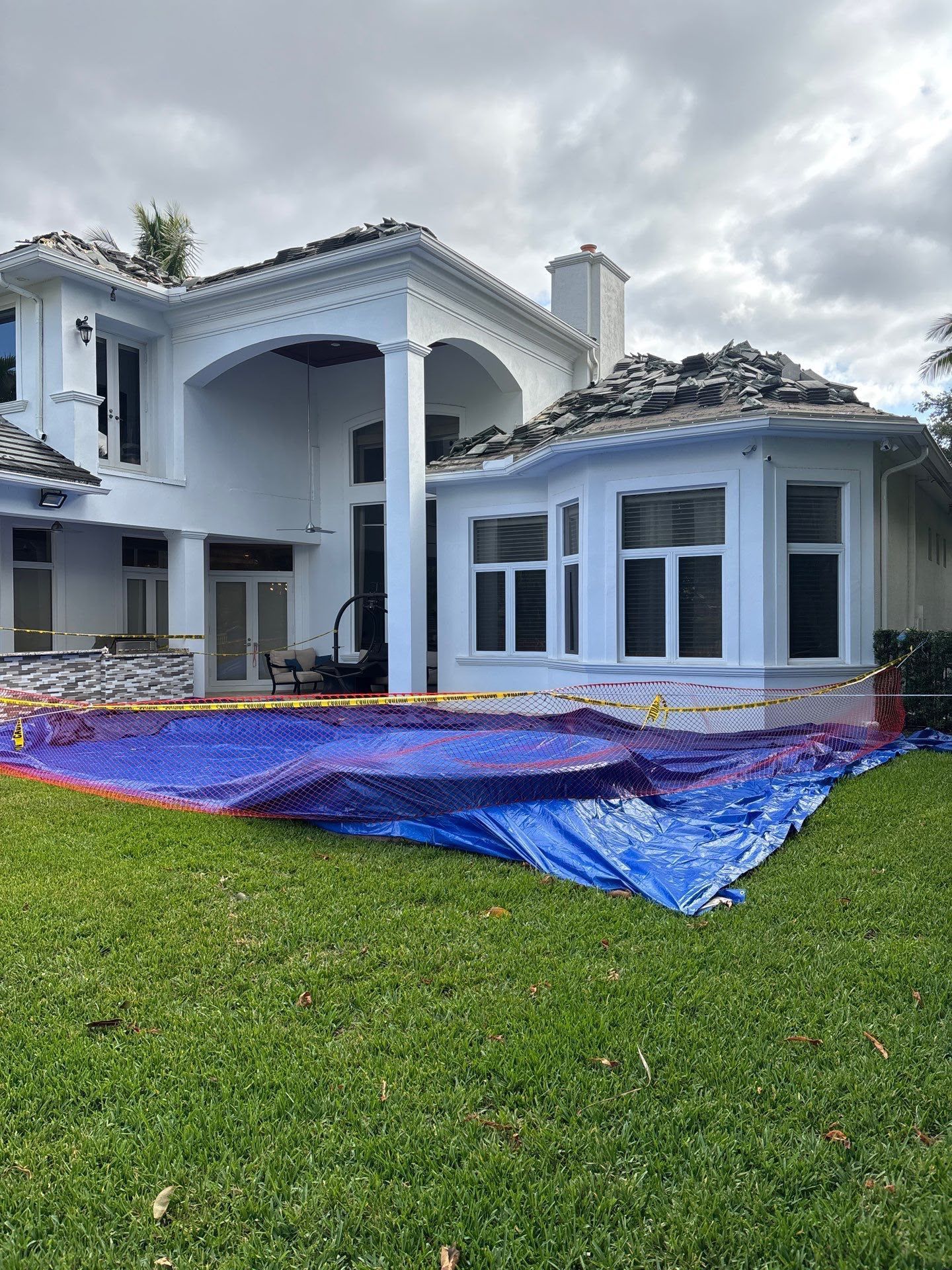 Crosstown Roofing crew completing roofing work in Florida