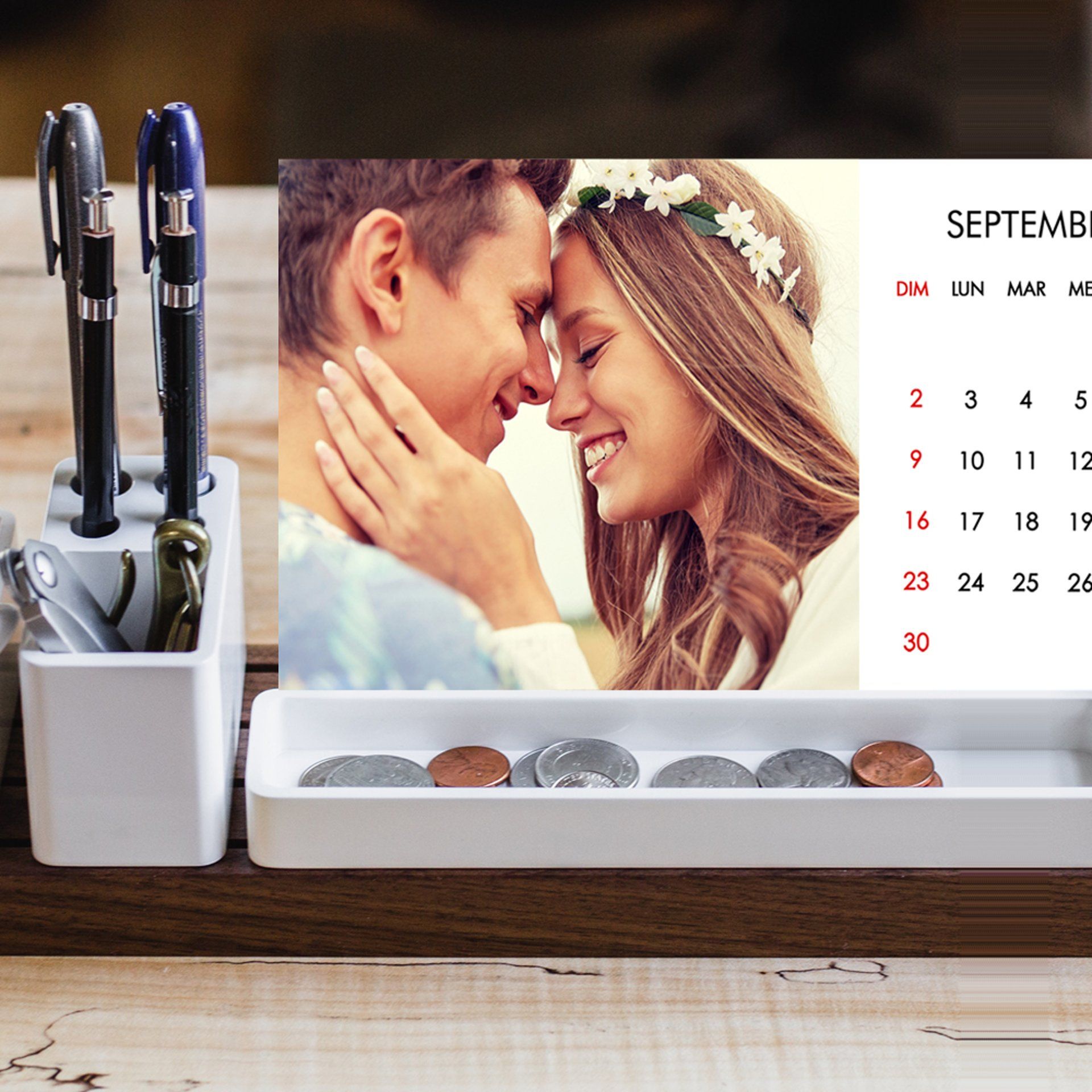 A calendar with a picture of a man and woman on it