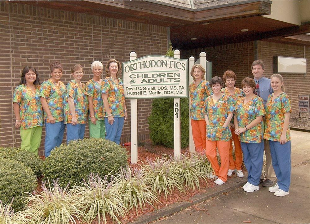 staff smiling outside | Beginning of our orthodontic practice | Hickory NC