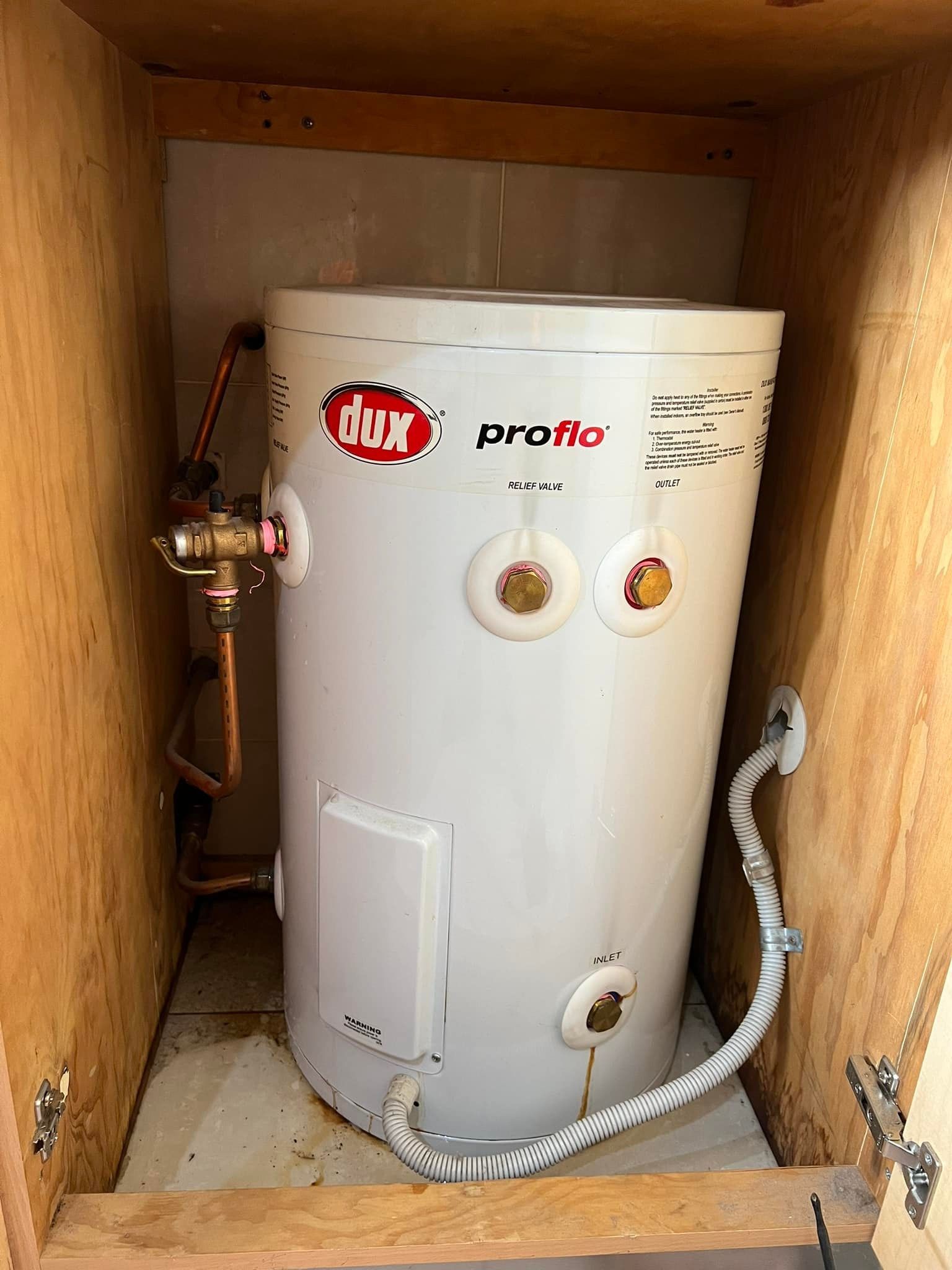 White Rinnai Hot Water Heater Mounted — Northern Plumbing Maintenance & Repairs in Leanyer, NT