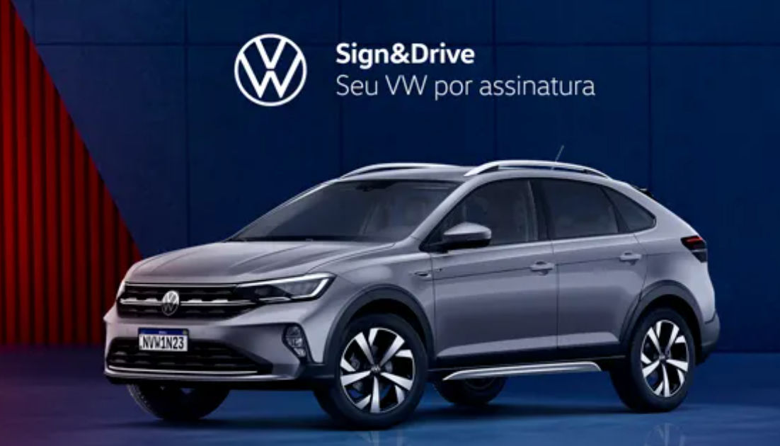 Volkswagen SUV prata em anúncio Sign&Drive com fundo azul e vermelho