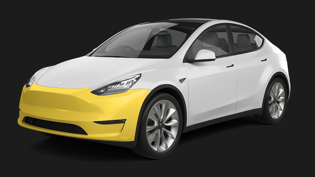 A white tesla model y with a yellow bumper on a black background.