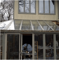 A Picture Of A White House With Sunroom — Millersville, MD — Chesapeake Construction, Inc.