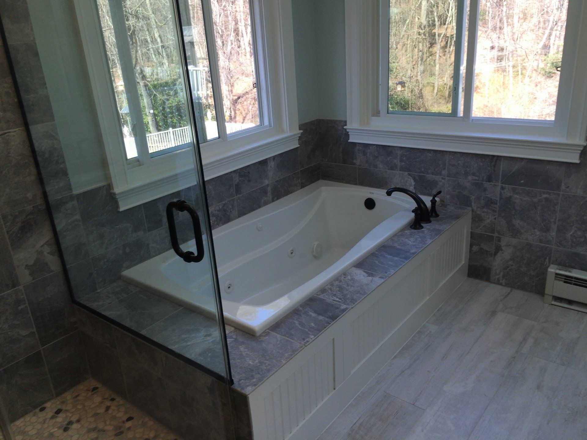 Worker Calling Someone — Millersville, MD — Chesapeake Construction, Inc.