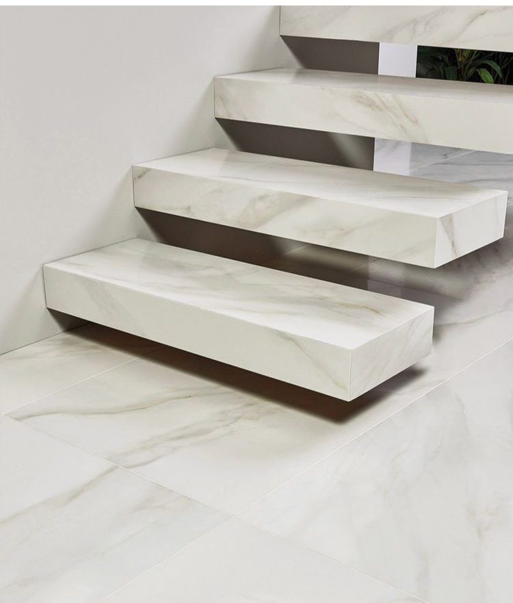 White marble floating stairs, modern architectural design.
