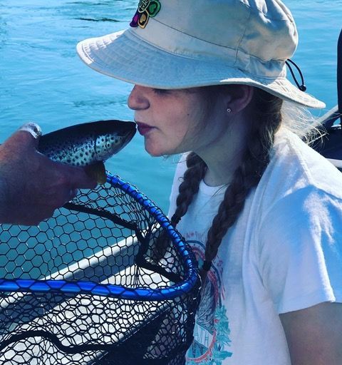 girl-kissing-a-fish