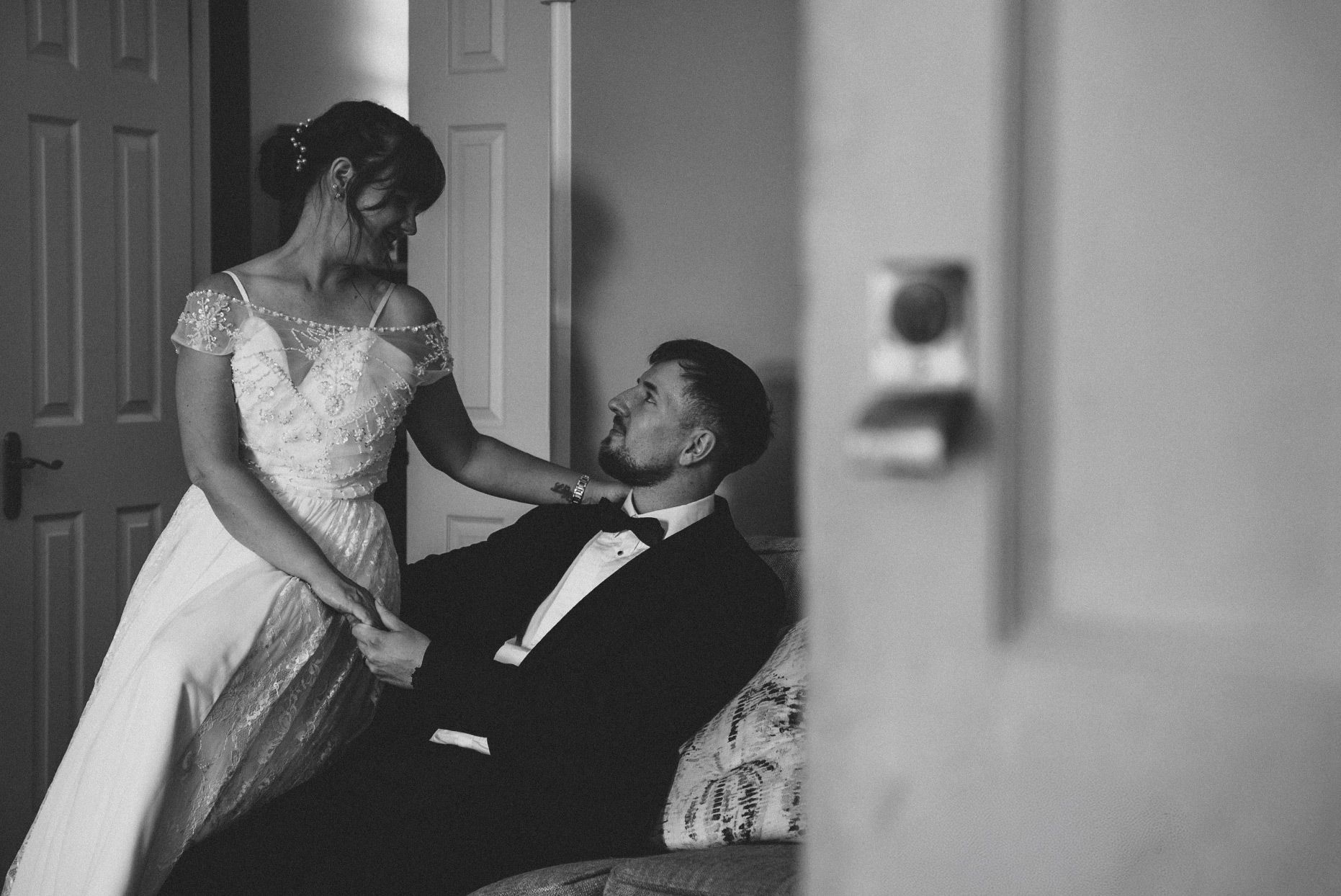 Newlywed couple sharing a quiet moment during their Lake District wedding