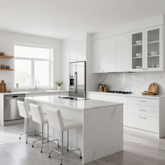 Bright white modern kitchen with island, bar stools, and large window