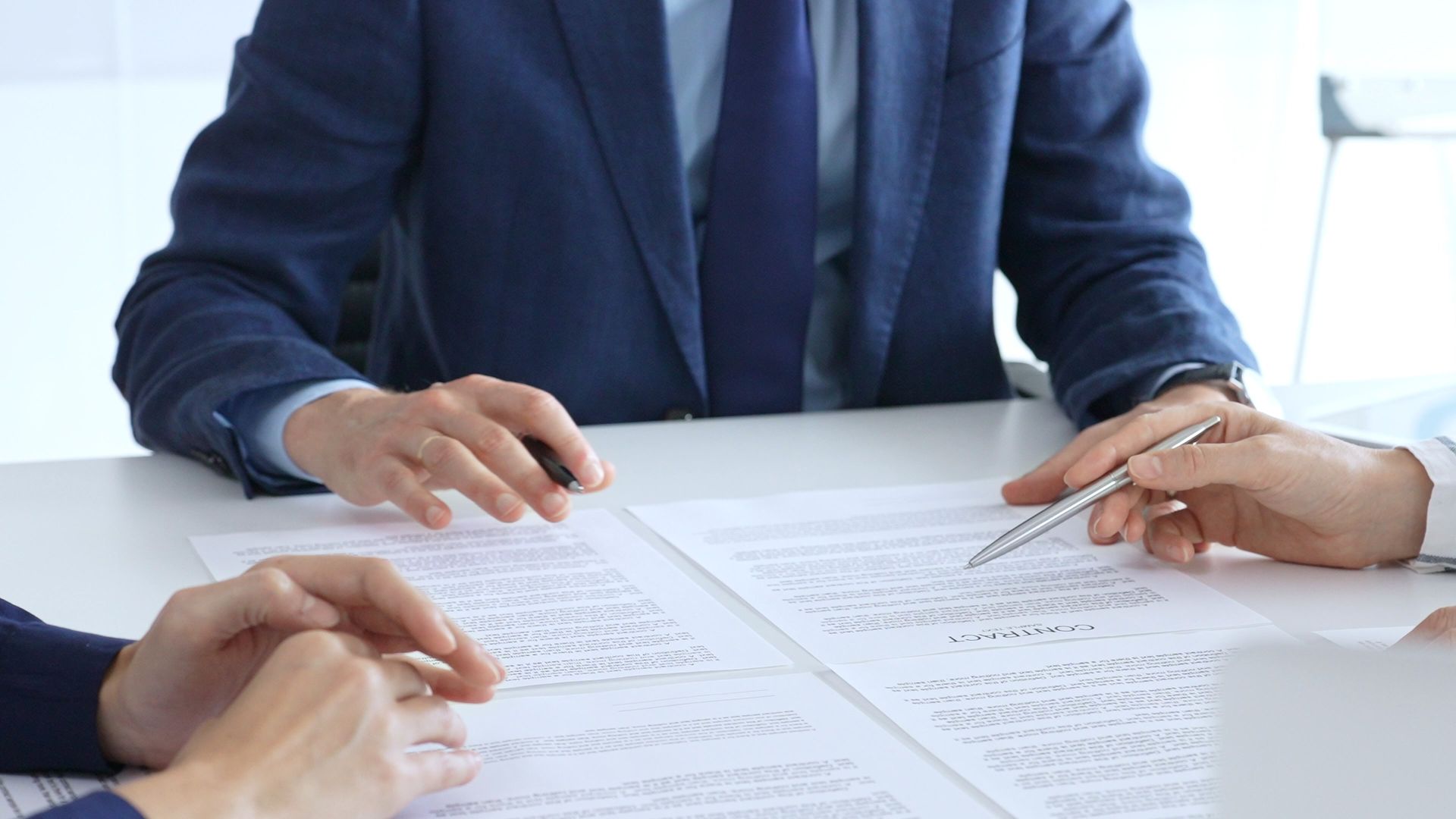 General civil attorney reviewing a contract with a client General civil attorney reviewing a contract with a client.