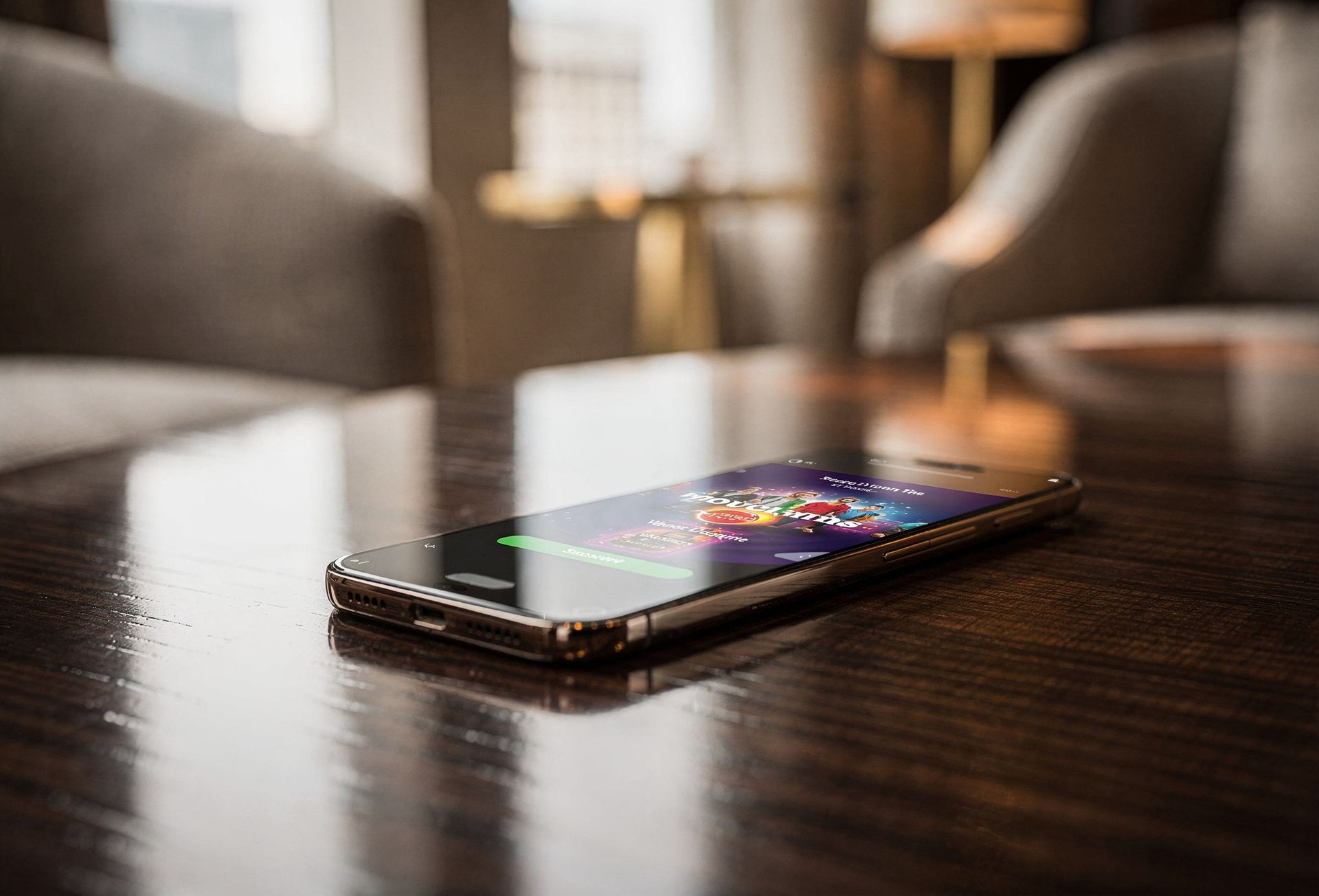 Smartphone lying on a marble table in a blurred indoor lounge setting