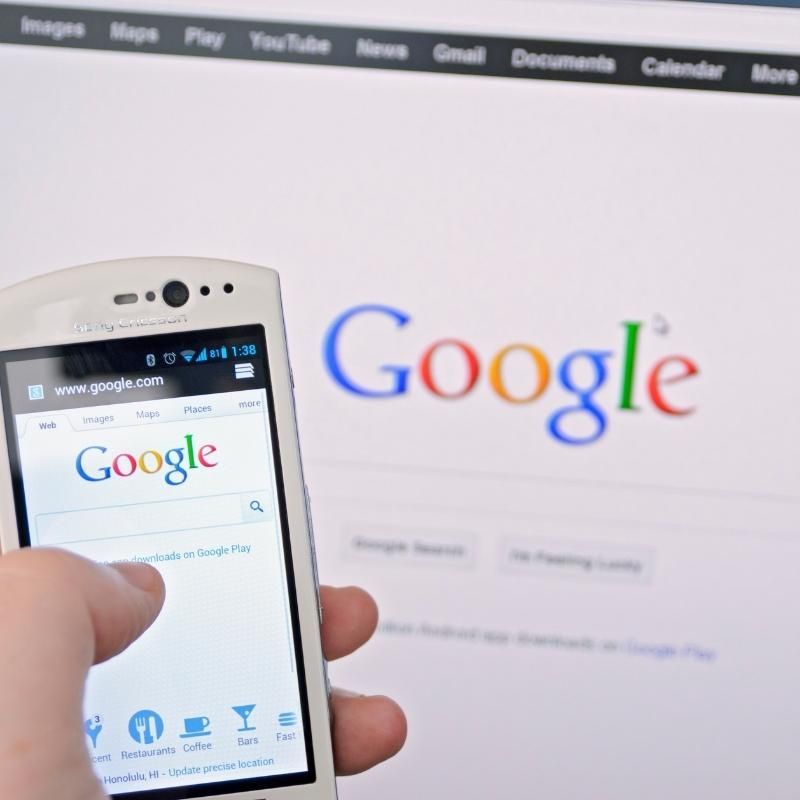 royal realty Lawrenceville Georgia - Sell your property image of a person doing a google search from their phone