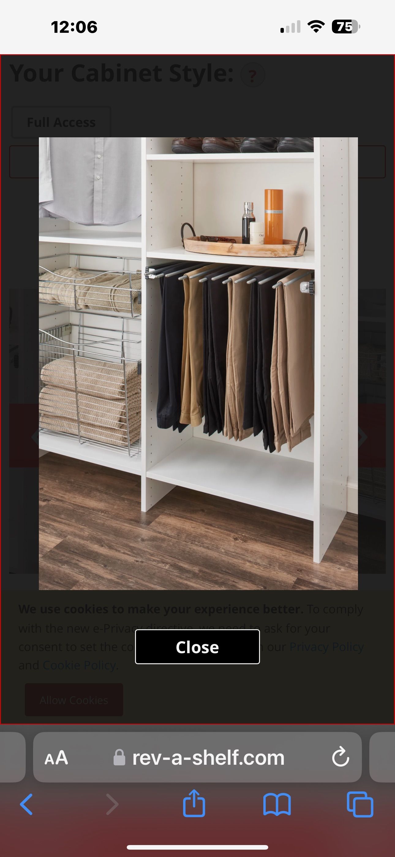White closet organizer with pants hanging, and shelves.