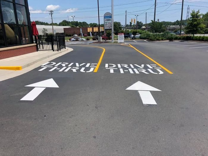 Two white arrows and the words 