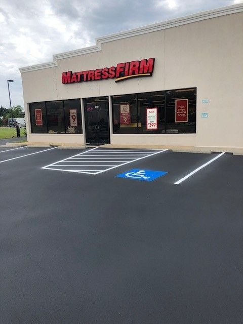 Mattress Firm storefront with empty accessible parking spaces in front