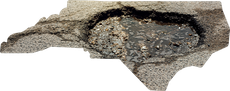 A shape of North Carolina filled with asphalt, depicting a large, water-filled pothole within the state's borders.