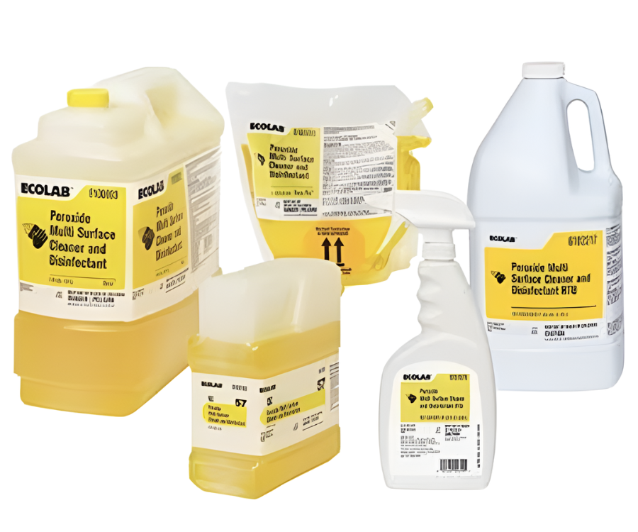 Several bottles of ecolab products are lined up on a white background