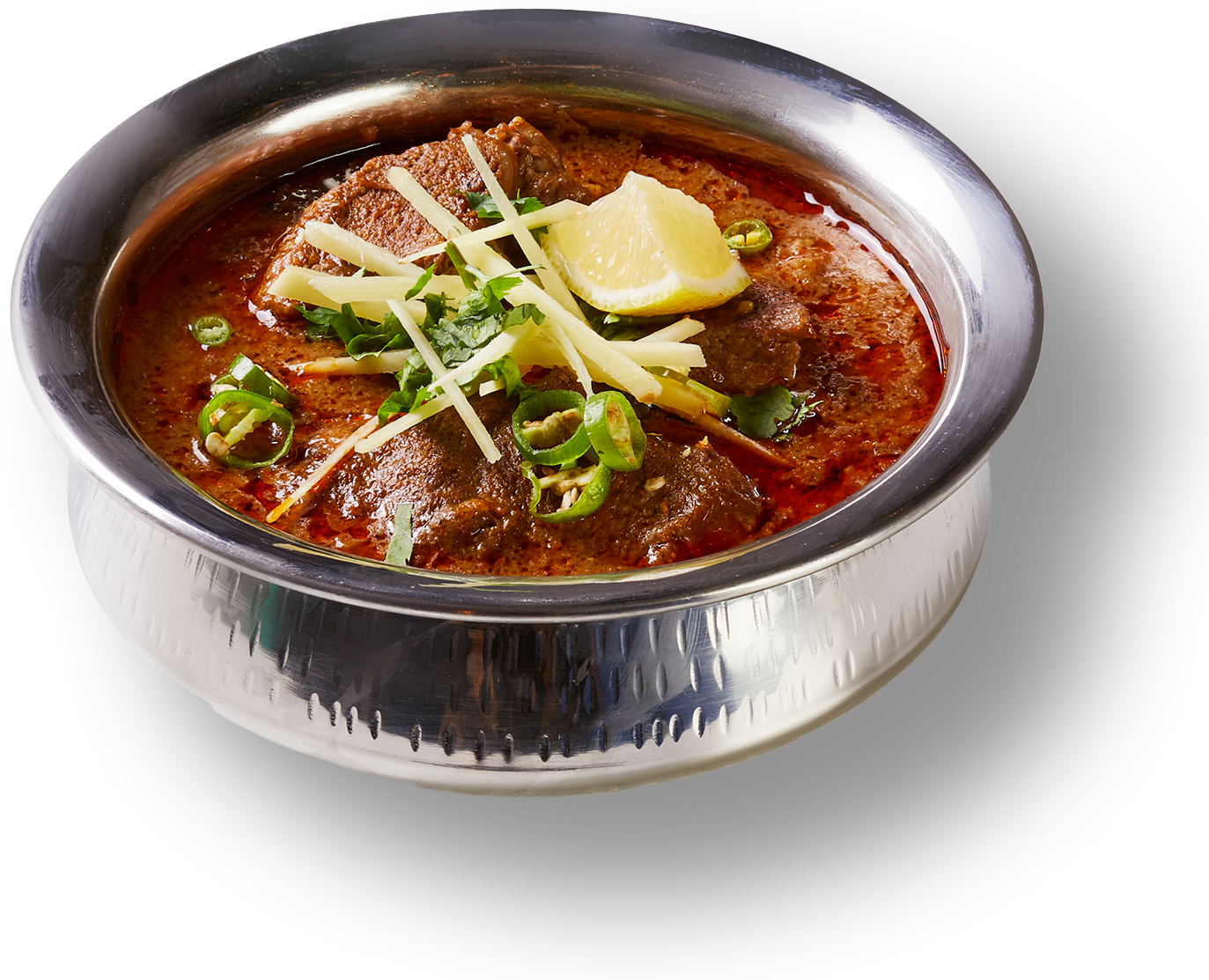 A bowl of stew with meat and vegetables on a white background