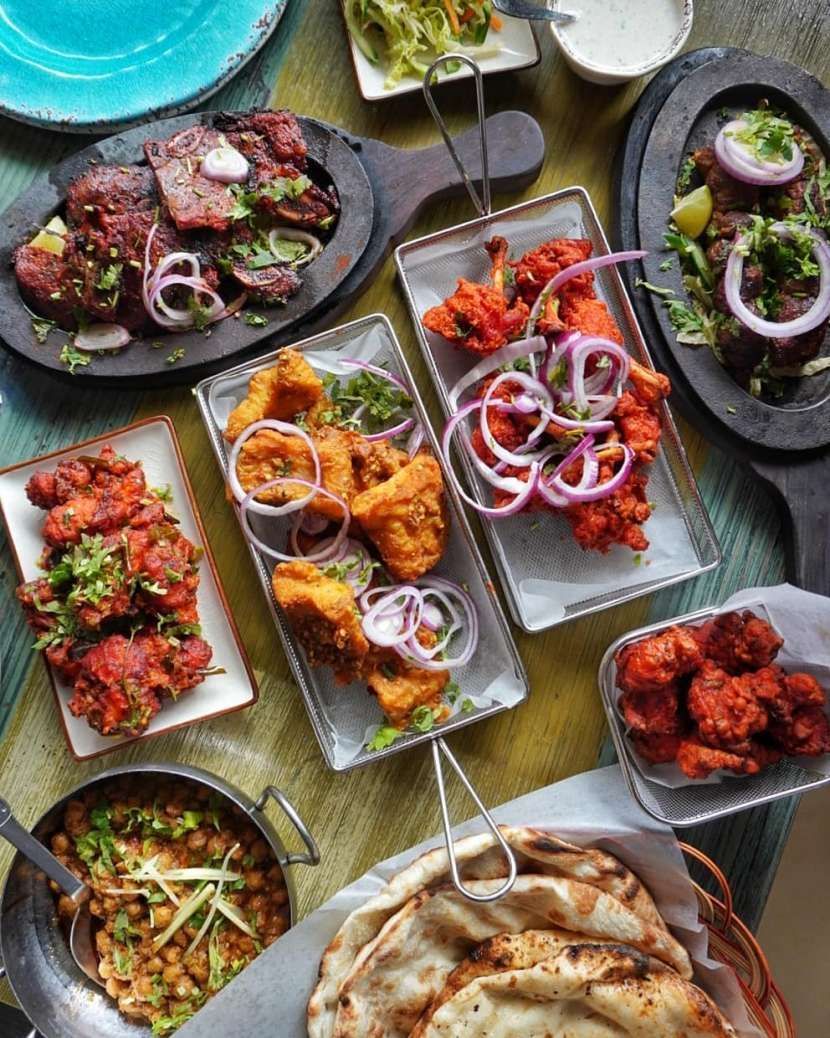 There are many different types of food on the table.