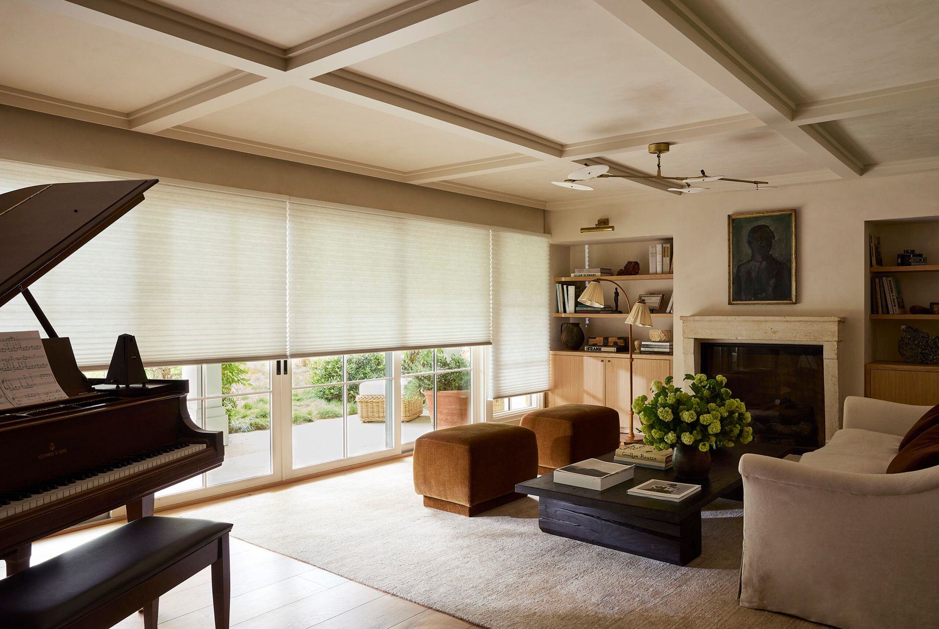 Hunter Douglas Duette® Cellular Shades covering French doors in a contemporary living room.