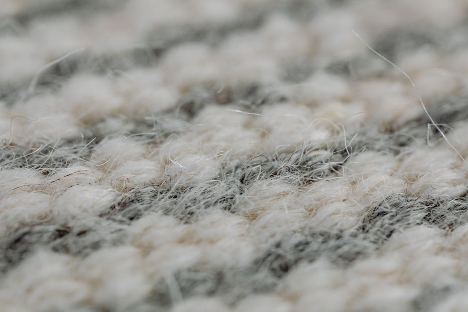 Vloerkleed schoonmaken met Biotex, wollen vloerkleed van dichtbij